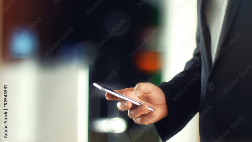 4K - UHD: Business Man using Mobile Phone in Office. 4K - UHD: Business Man using Mobile Phone in Office.