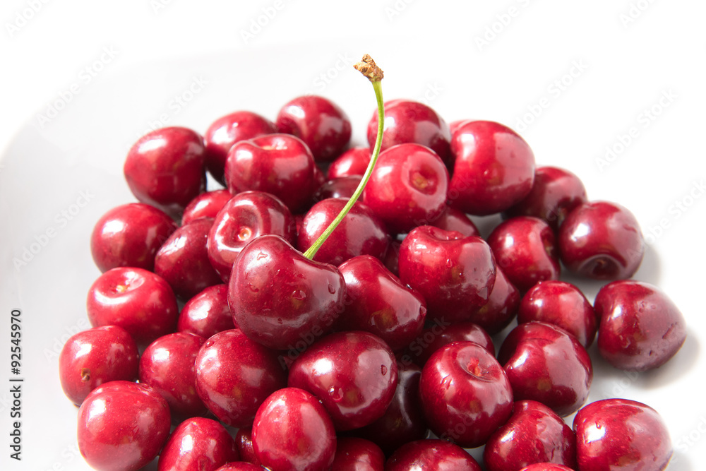 Bowl of red fresh cerries on a white background Bowl of red fresh cerries on a white background