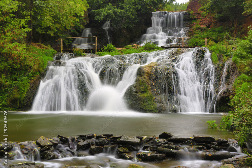 Nice waterfall in autumn forest