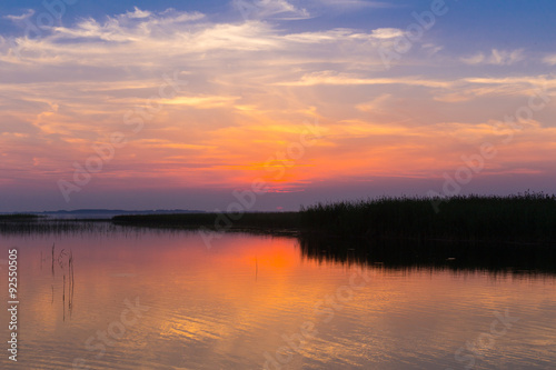 Sunset over the lake © idea_studio