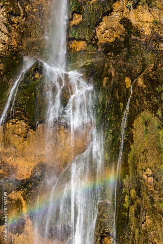 Fototapeta Naklejka Na Ścianę i Meble -  Waterfall with rainbow in national park Plitvice, Croatia