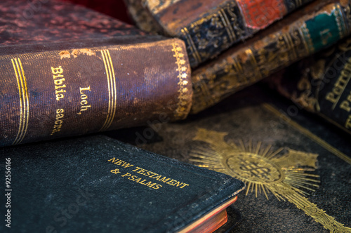 Old antique gilded Bibles and books