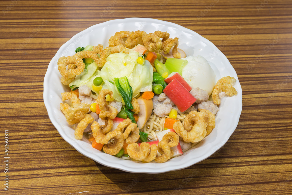 Noodles with vegetables and meat to eat healthy on wood table, Thai food