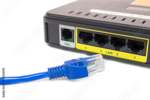 Close up LAN UTP RJ45 Cat5e In front of ADSL Router network switch