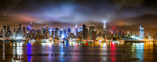 New York City Panorama on a cloudy night as viewed from New Jersey across the Hudson River #92562387