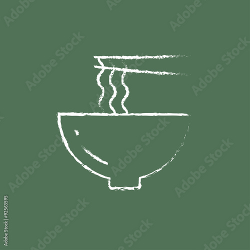 Bowl of noodles with a pair chopsticks icon drawn in chalk.
