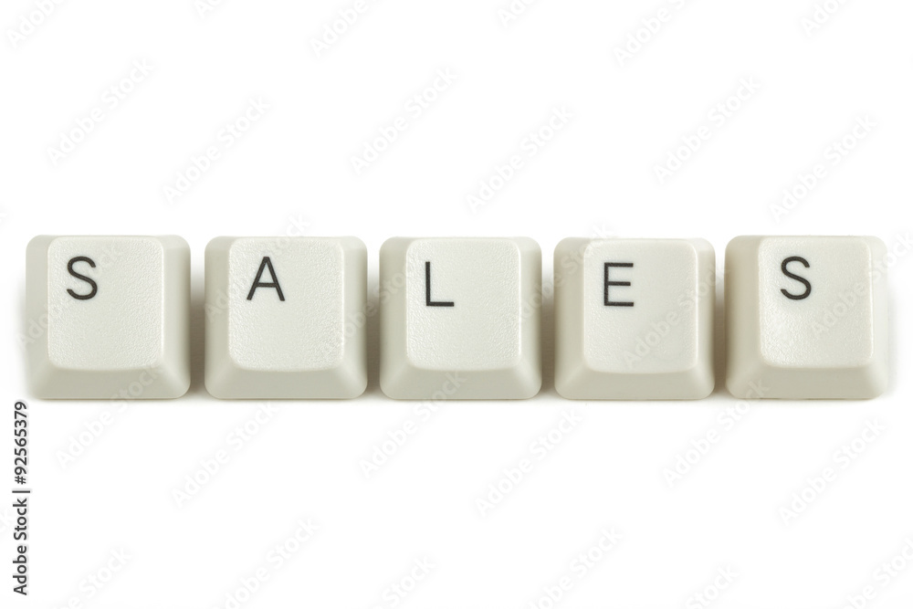 sales from scattered keyboard keys on white sales from scattered keyboard keys on white