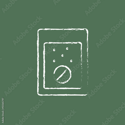 Tablet into a glass of water icon drawn in chalk.
