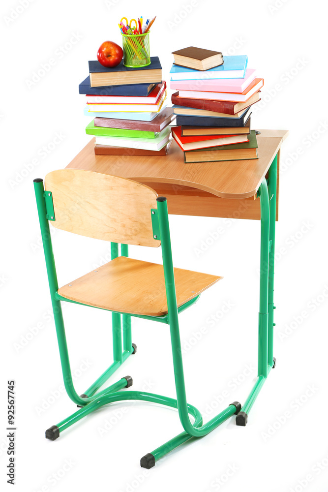 Wooden desk with books and chair isolated on white Wooden desk with books and chair isolated on white