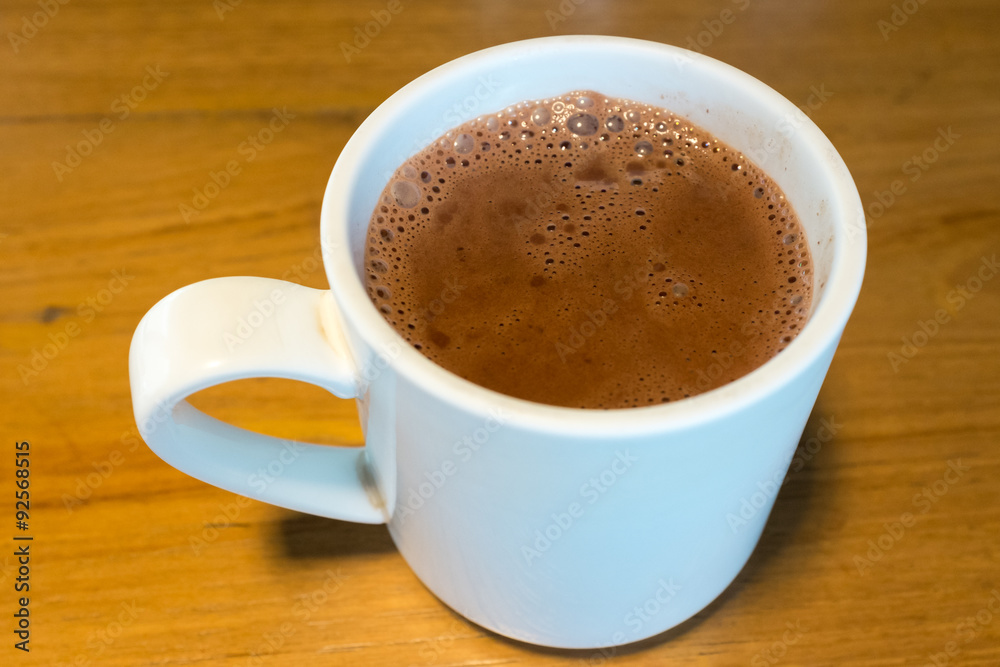 Pure hot chocolate in a white mug Pure hot chocolate in a white mug