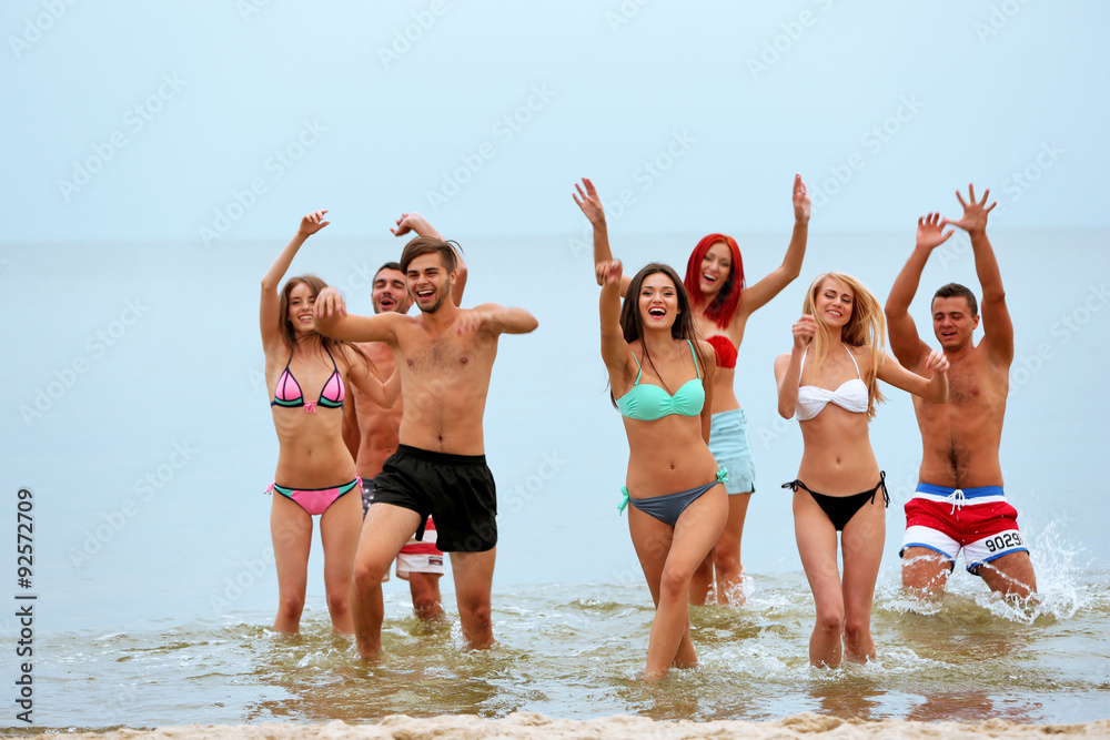 Beautiful young people having fun on beach Beautiful young people having fun on beach