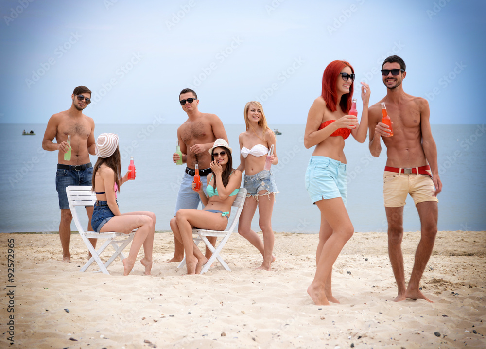 Beautiful young people having fun on beach Beautiful young people having fun on beach