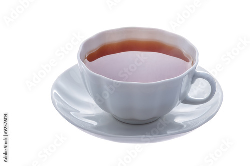 White cup of tea on a saucer.