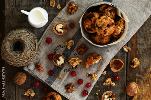 Homemade cookies with dried cranberry and walnut for cozy breakf © so_lizaveta