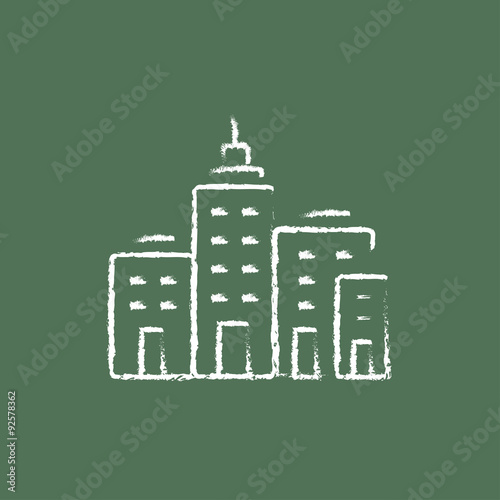 Residential buildings icon drawn in chalk.