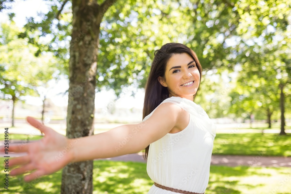 Portrait of happy woman with arms outstretched Portrait of happy woman with arms outstretched