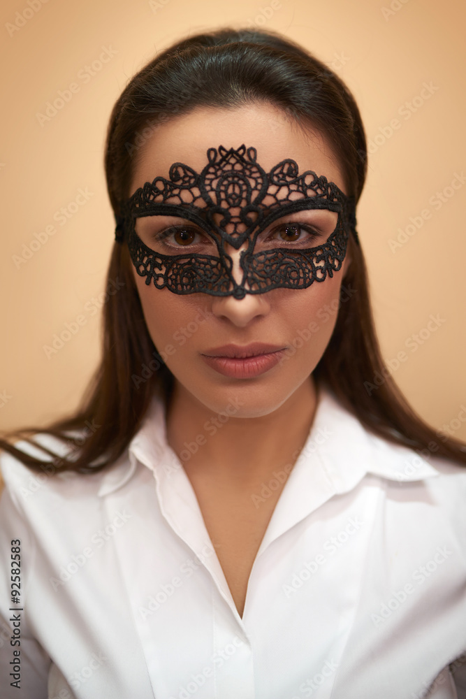 Closeup of a woman in lacy mask Closeup of a woman in lacy mask