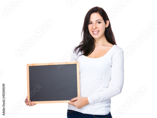 Brunette woman show with chalkboard