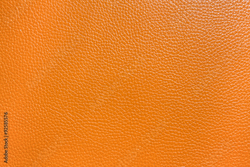 Orange color leather background © namning
