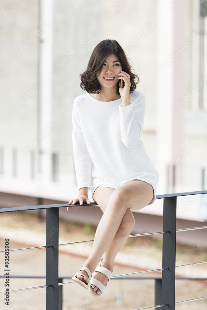Fototapeta premium asian woman hold mobile