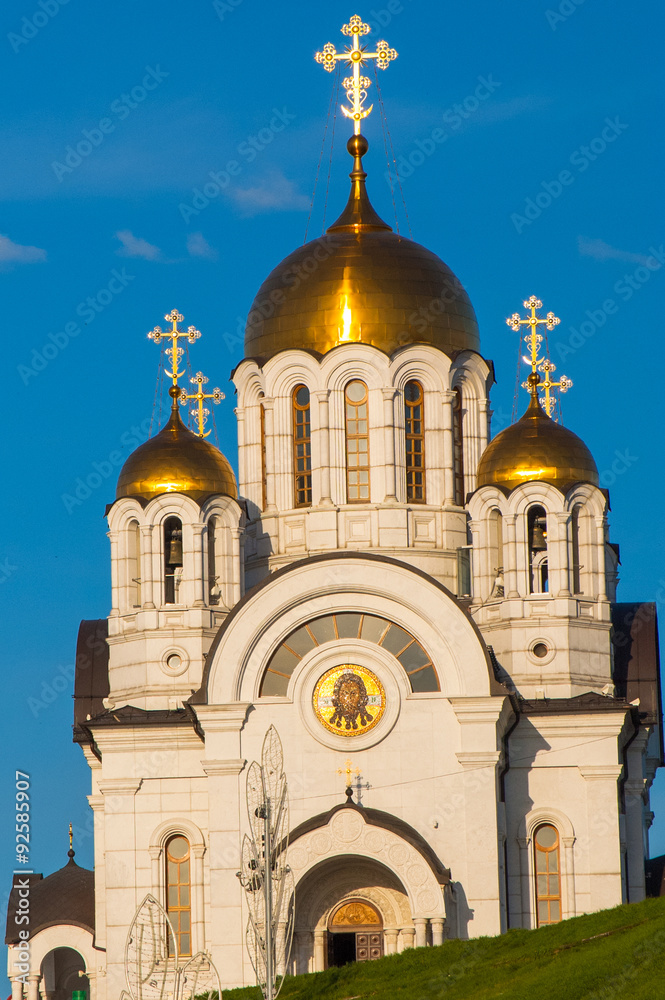 Golden domes of the Russian Christian church against the deep blue sky, Samara, Russia.