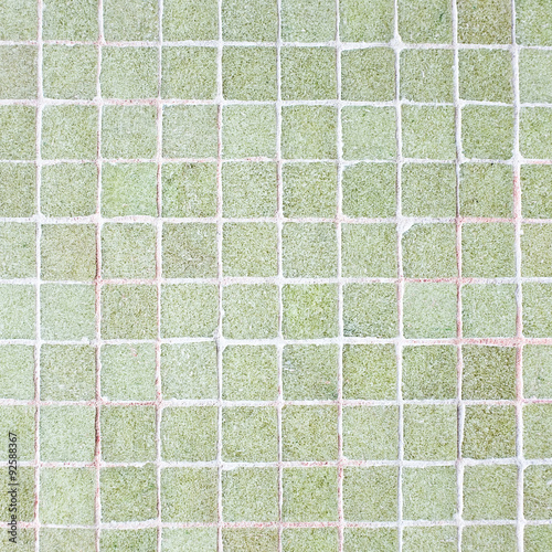 squared green tiles - close up of abstract textured background