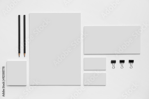 Blank branding mockup with gray business cards on white