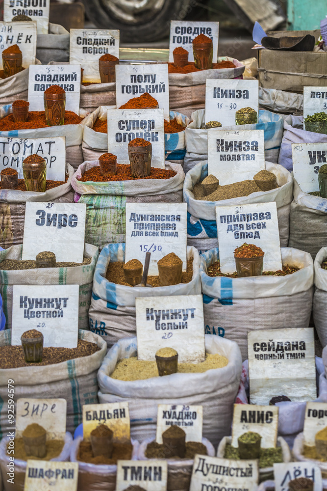 Fototapeta premium Vivid oriental central asian market with bags full of various sp