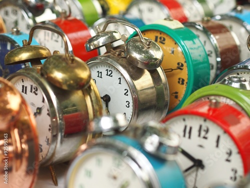 Group of colorful old alarm clocks