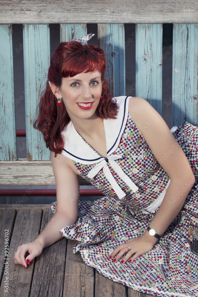 Fototapeta premium pinup young woman in vintage style clothing