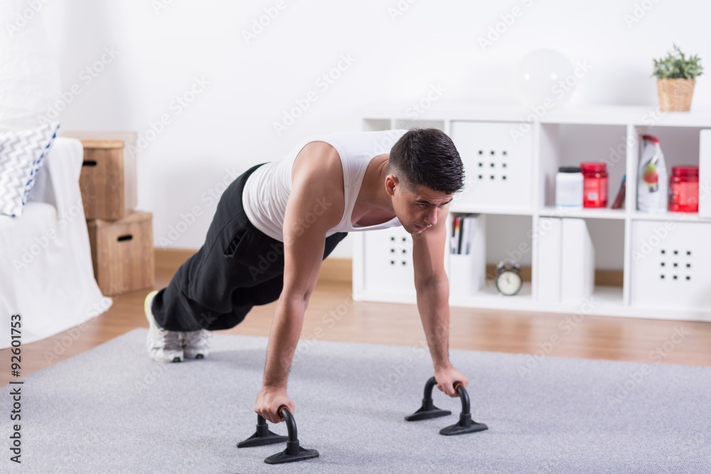 Bodybuilder doing push ups Bodybuilder doing push ups