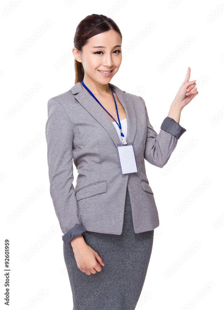 Young businesswoman with finger point up Young businesswoman with finger point up