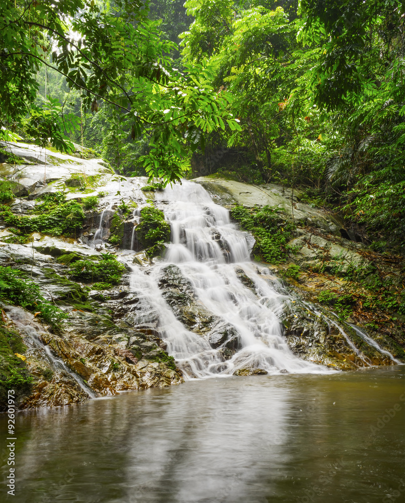 Beautiful waterfall in tropical rainforest in Malaysia. Beautiful waterfall in tropical rainforest in Malaysia.