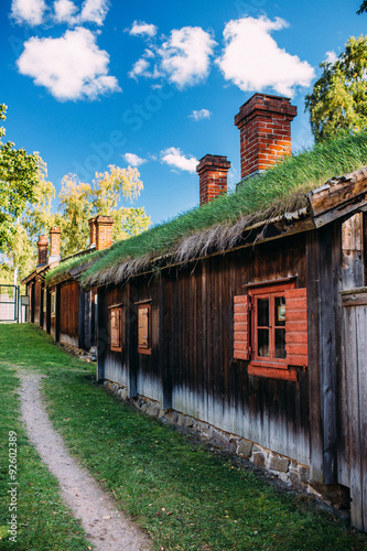 Traditional house with a grass roof in the Faroe Islands photo