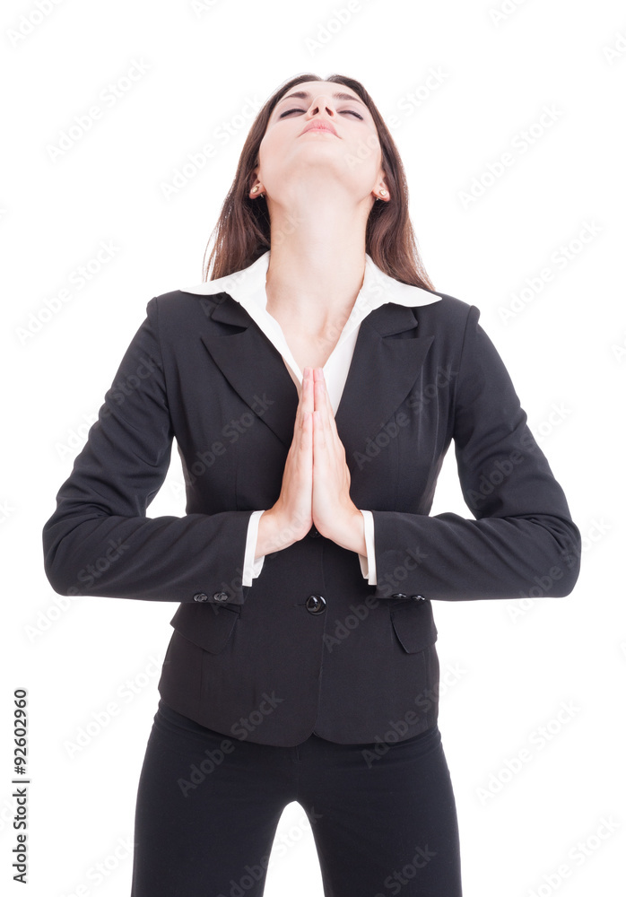 Elegant business woman praying with eyes closed Elegant business woman praying with eyes closed