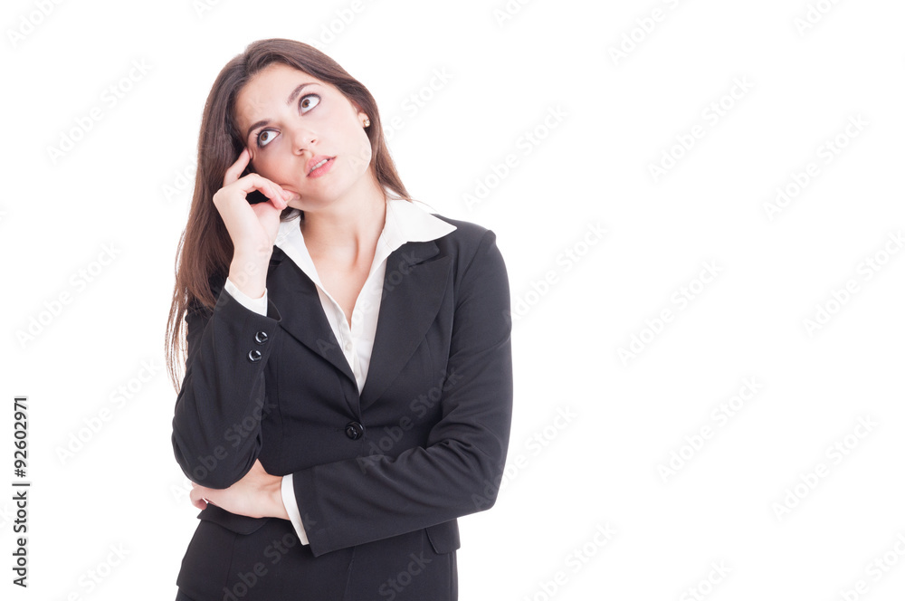 Young business woman thinking and wondering Young business woman thinking and wondering