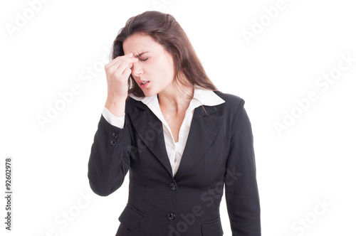 Female financial manager having a painful migraine after stress