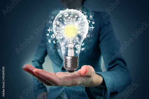 Light bulb in hand with application