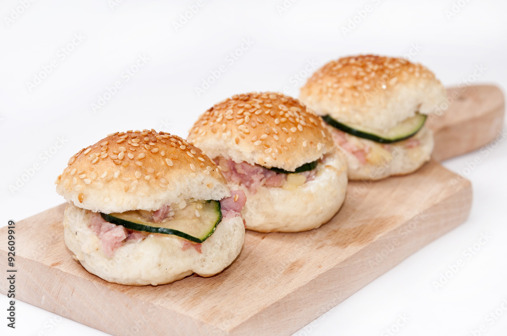 Hamburger sandwiches with ham and cucumber Hamburger sandwiches with ham and cucumber