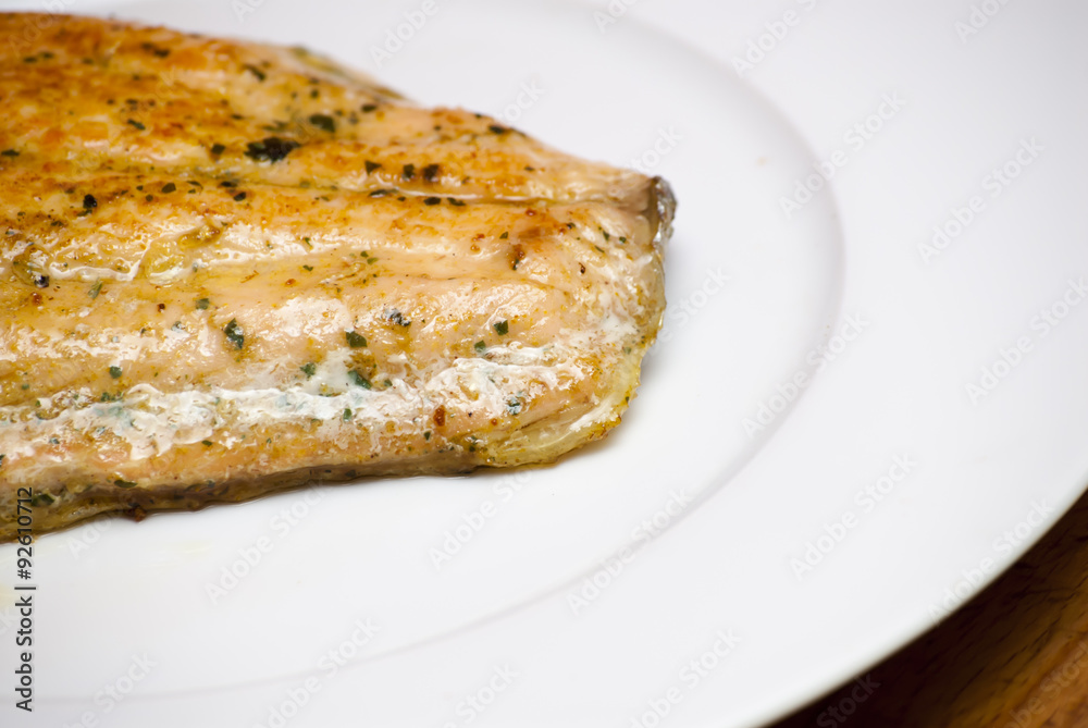 Grilled salmon on a white plate Grilled salmon on a white plate