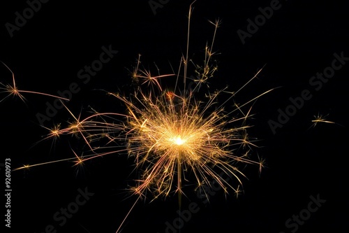 Detail view of a sparkler at night