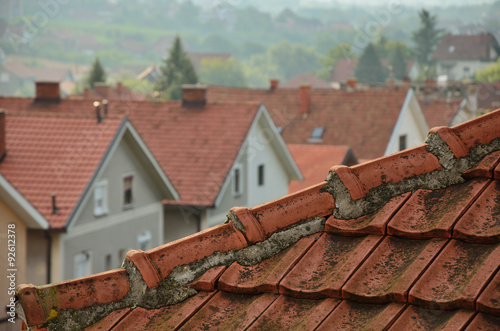 Tiled roof and line of houses