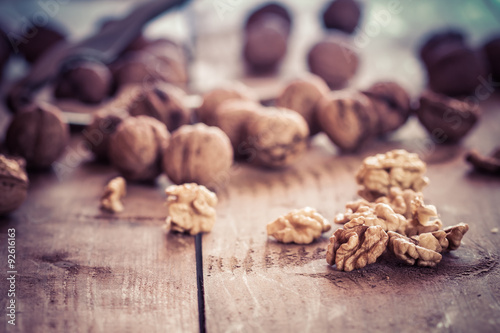 Walnuts on a wooden table.