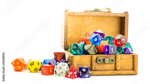 Wooden chest overflows with dice