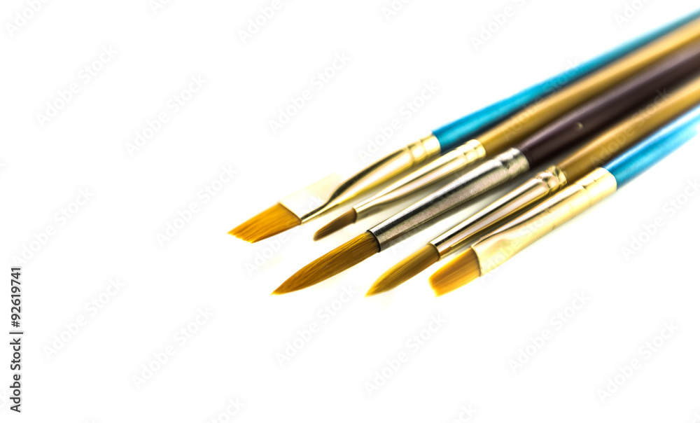 Fine bristle paint brushes on a white background