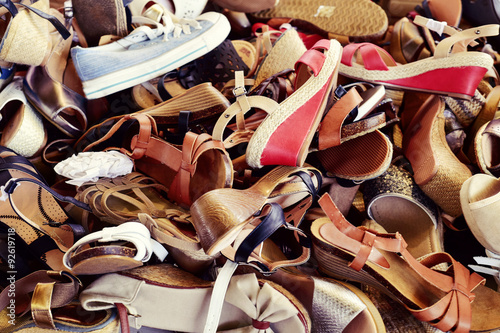 woman shoes on sale in a street market