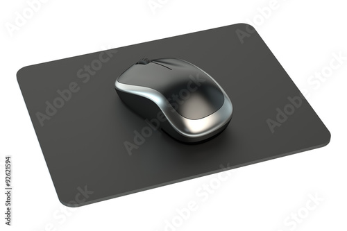 Wireless Computer Mouse on mousepad photo