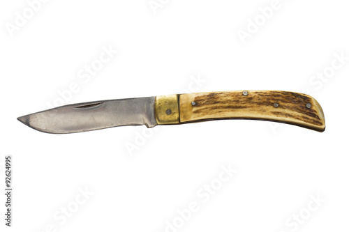 Studio shot of old hunting knife isolated on white.
