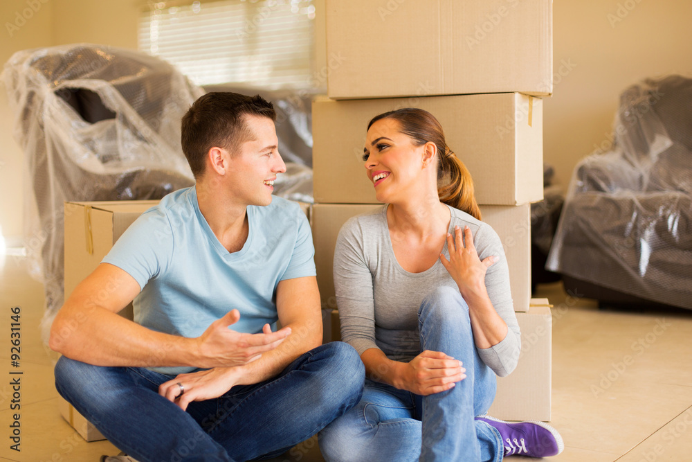 young couple relaxing in new house young couple relaxing in new house