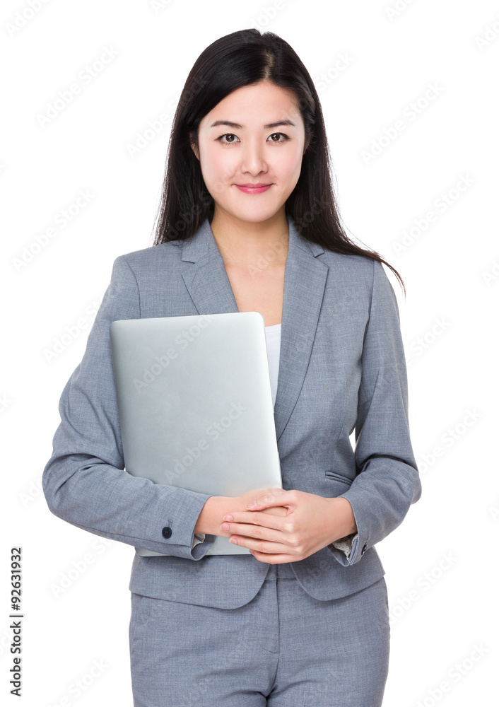Asian young businesswoman hold with laptop computer Asian young businesswoman hold with laptop computer